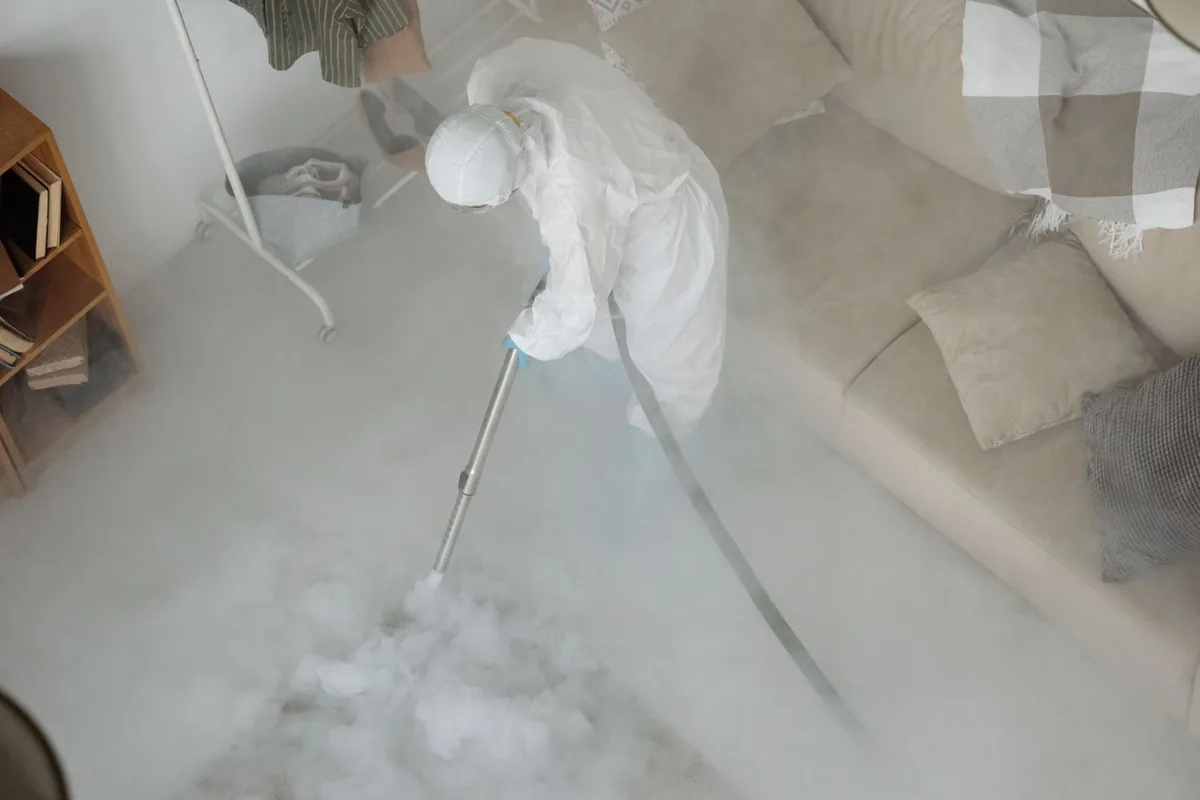 Biohazard cleanup technician in protective equipment, Glen Lyon, PA